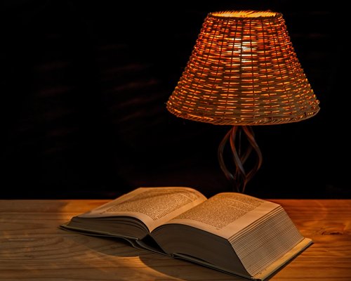 Nighttime reading with soft lamp light